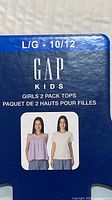 Retail hanger card showing size L/G 10/12 and Gap Kids branding