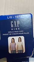 Retail hanger card showing Gap Kids Girls 2 Pack Tops size L/G 10/12