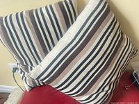 Two striped square pillows showing full fronts