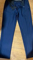 Full view of navy Kenneth Cole dress pants front side