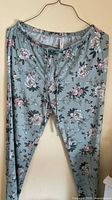 Full view of Flora Nikrooz wide-leg floral pajama pants