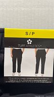 Retail cardboard label showing size S/P, brand, inseam measurement