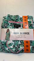 Front of packaged Room Service pajama set showing branding, size XXL, and leaf print