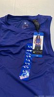 Front view of royal blue Spyder cooling tank top with tags