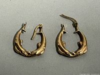 Front view of both 9K gold drop earrings
