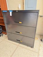 Front view of black metal 3-drawer Haskell lateral file cabinet
