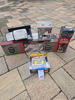 Group shot of all boxed outdoor lighting fixtures