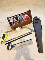 Group shot of all items including tool caddy, saws, fasteners