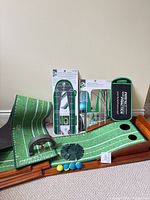 Overall lot with mat, rail, training boards, carry case, cup dome and balls