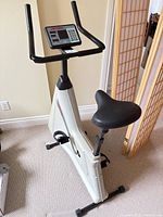 Full view of bike showing frame, console, seat and pedals