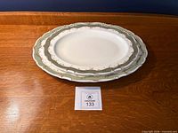 Both matching oval platters stacked