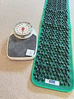 Scale and mat full view on carpet