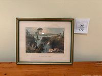 Front view of framed lithograph print showing artwork, mat and frame