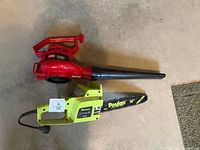 Toro blower and Poulan chainsaw side by side