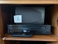 Yamaha CD changer with remote and bookshelf speaker