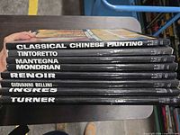 Stack of eight Abbey Library art books, spine view showing all titles