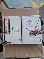Front covers of both Buffy the Vampire Slayer volumes 1 and 2