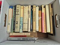 Box containing assorted Canadian history and politics books
