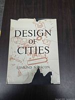 Front of book showing title, author and torn dust jacket