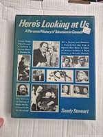 Front cover showing title, author, photos, price sticker