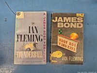 Front covers of both paperback novels