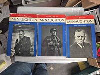 Front covers of all three volumes