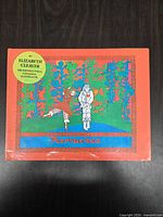 Front cover showing title, author sticker, and illustration