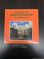 Front cover of hardcover book showing title, author and artwork