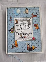 Front cover of hardcover book showing title and illustrated design