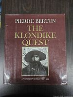 Front cover showing title, author, cover image, dust jacket wear