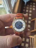 Front view of Timex moonphase watch showing dial and strap