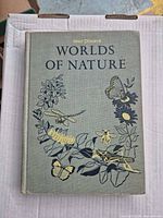 Front cover showing title, illustration and cloth texture