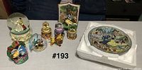 Group view of all six Disney musical and water globe items