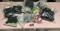 All packaged black lace and lingerie items grouped on table