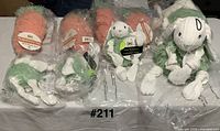 Group view sealed plush bunnies and carrots