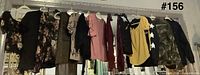 All garments hanging on rack showing variety and count