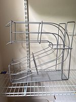 Side view showing curved wire frame and mesh base