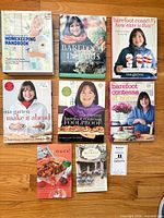 All eight books laid out front covers visible