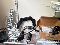 Group shot showing both flexible power strips, two timers, filter kit, chargers