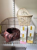 Group shot showing all three baskets and two boxed diffusers