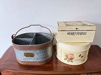 All three storage containers together on table