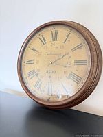 Front angled view of Casablanca wall clock showing frame and dial