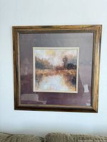 Frontal view of framed abstract landscape artwork
