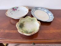 Overview of three porcelain bowls on tabletop