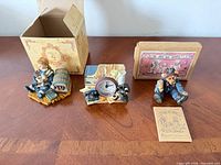 Overview of all three figurines with boxes