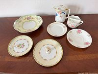 Group shot of all seven porcelain pieces