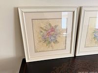 Front view of first framed floral print