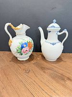 Both porcelain pieces side by side for size and form comparison