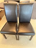 Front view of both chairs showing seats and backs