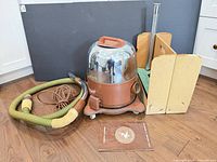 Full lot with vacuum, hose, wand, cardboard pieces, manual